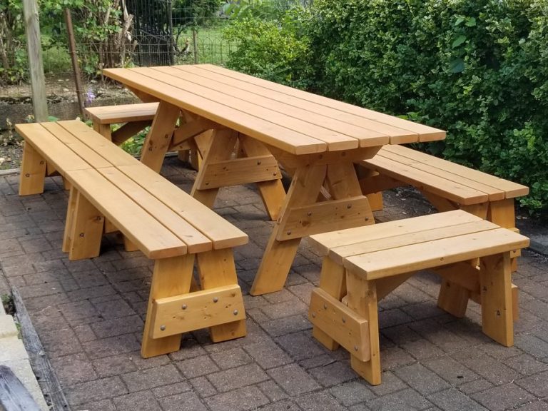 Commercial quality Custom Eco-friendly Outdoor Detached Bench Picnic Table with six benches slanted right on a patio.