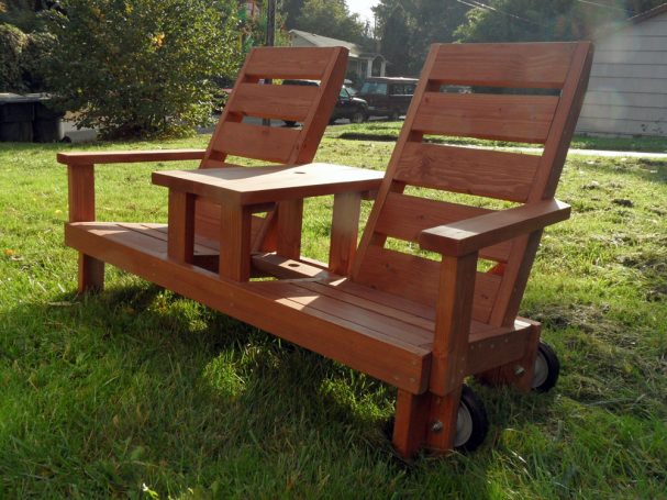 Custom 5' Commercial quality eco-friendly Outdoor Park Bench with center table and wheels slanted to the left.
