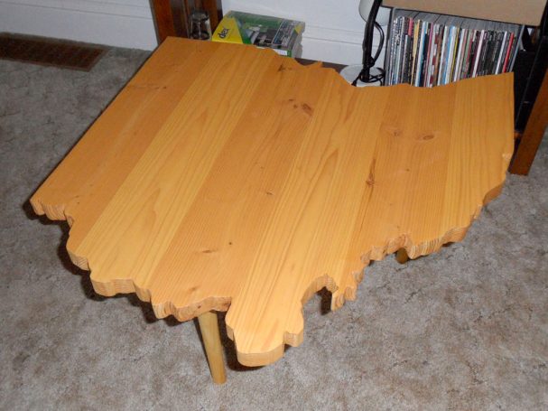 Handcrafted Douglas Fir Ohio Shaped End Table slanted slightly to the left.