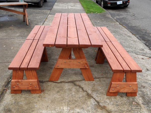 Commercial quality Custom Eco-friendly Outdoor Detached Bench Picnic Table with four benches from the front on sidewalk.