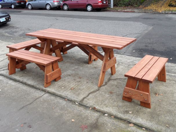 Commercial Custom Eco-friendly Outdoor Detached Bench Picnic Table with four benches arranged uniquely slanted left.