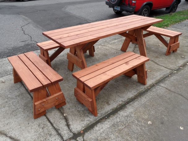 Commercial Custom Eco-friendly Outdoor Detached Bench Picnic Table with four benches arranged uniquely slanted right.