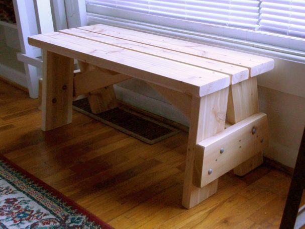 Commercial quality eco-friendly Outdoor Picnic Table Bench slanted to the left in a house.