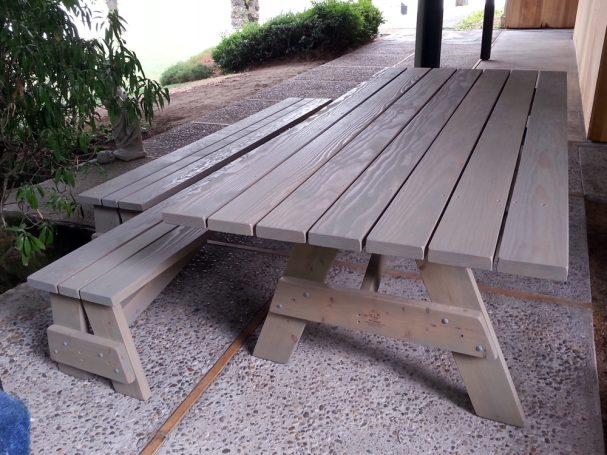Extra wide Commercial quality Custom Eco-friendly Outdoor Detached Bench Picnic Table with two benches on a patio.
