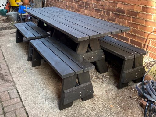 Ebony stain color option on a Large Commercial quality Custom Eco Outdoor Detached Bench Picnic Table with four benches.