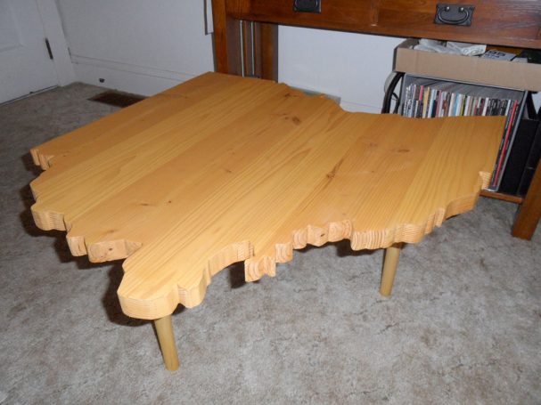 Handcrafted Douglas Fir Ohio Shaped End Table slanted to the left.