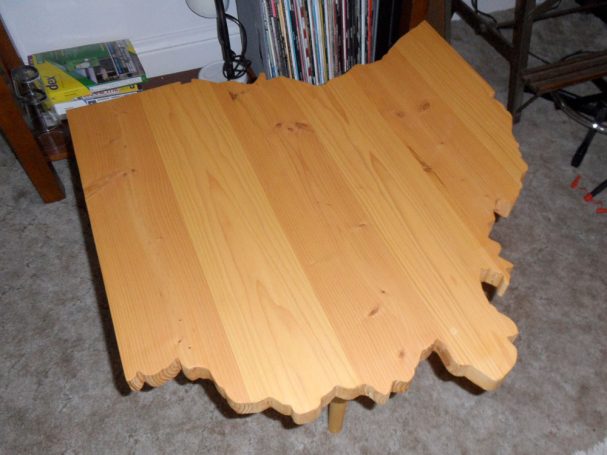Handcrafted Douglas Fir Ohio Shaped End Table slanted slightly to the right.