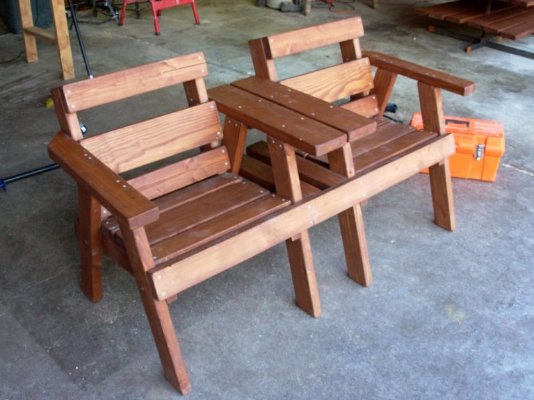 Dark brown 5' Commercial quality eco-friendly Outdoor Park Bench with a center table slanted to the right.